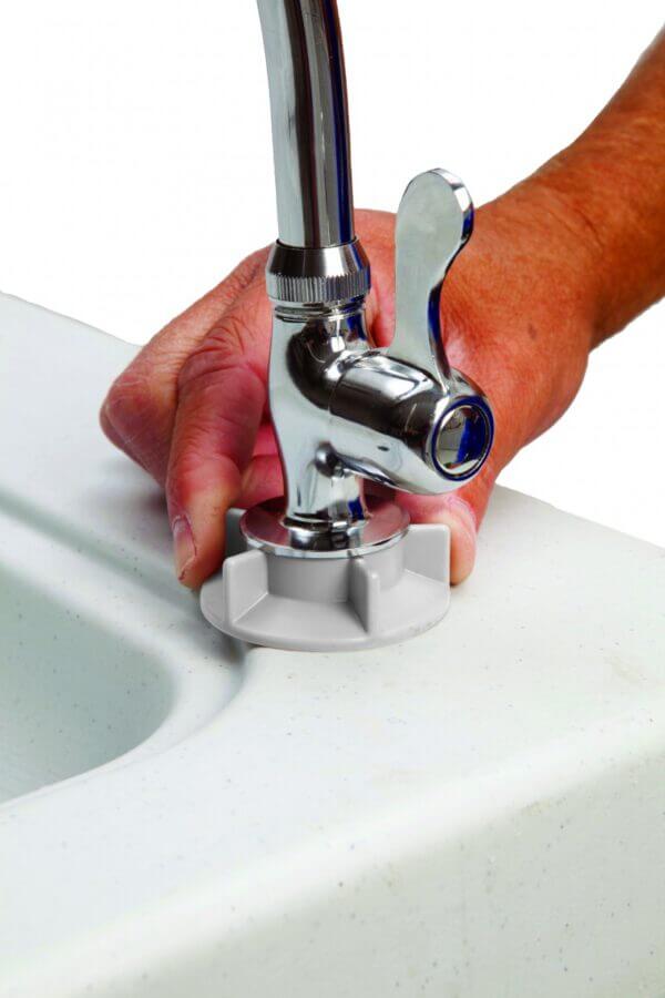Attaching faucet to sink