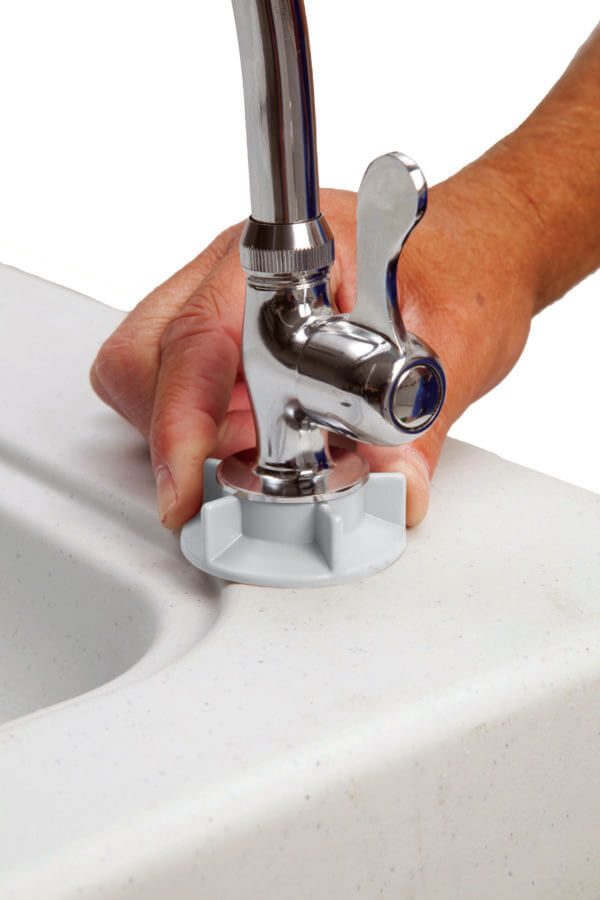 Attaching faucet to table