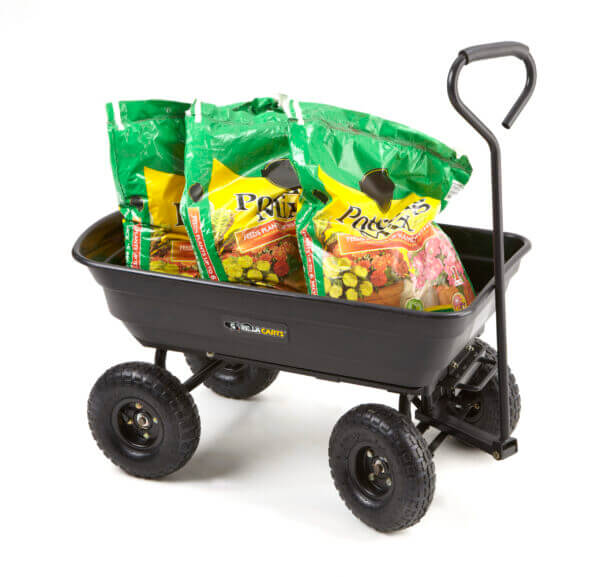 Cart holding bags of soil