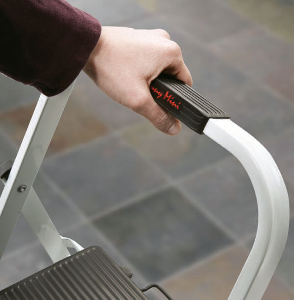 Person holding ladder handle